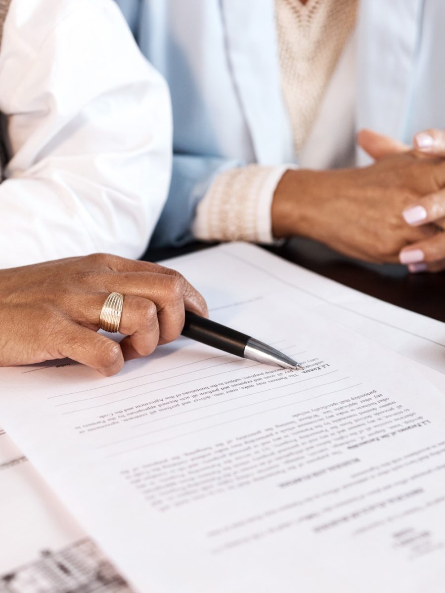 Contract, paper and people hands with document for legal advice, law firm strategy and negotiation